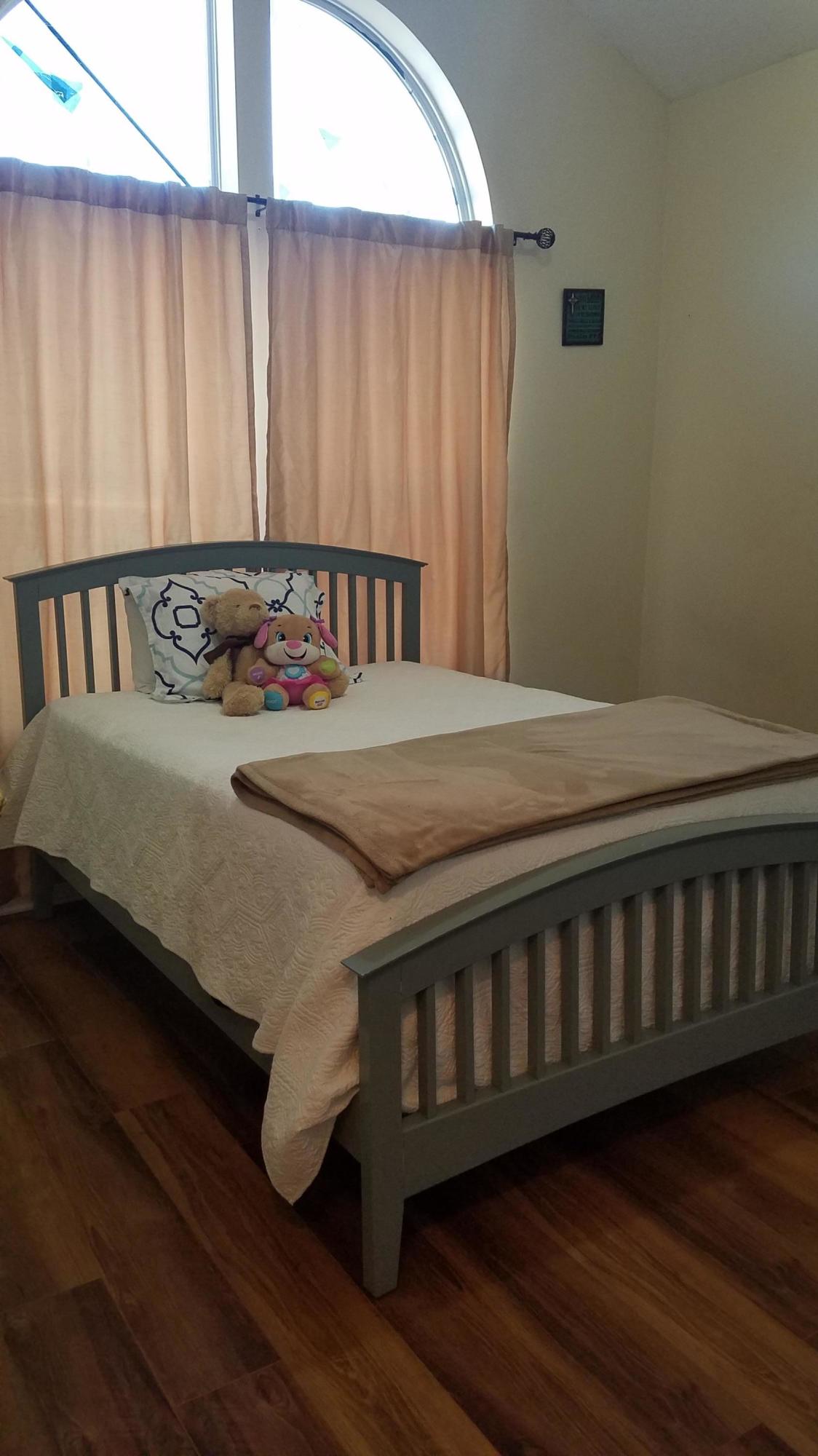 732 East Mack Bayou Drive, Unit 8 Santa Rosa Beach, FL 32459 - Photo 16 of 17 a bedroom with a bed and wooden floor