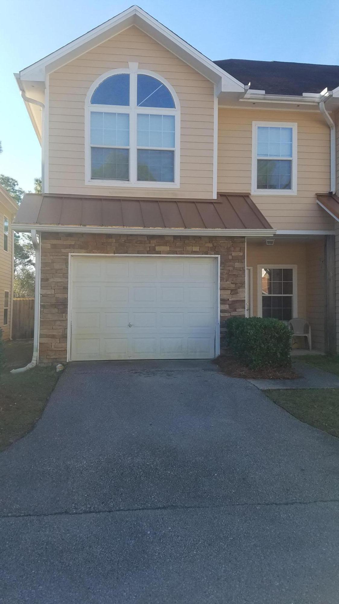 732 East Mack Bayou Drive, Unit 8 Santa Rosa Beach, FL 32459 - Photo 17 of 17 a view of the house with a yard