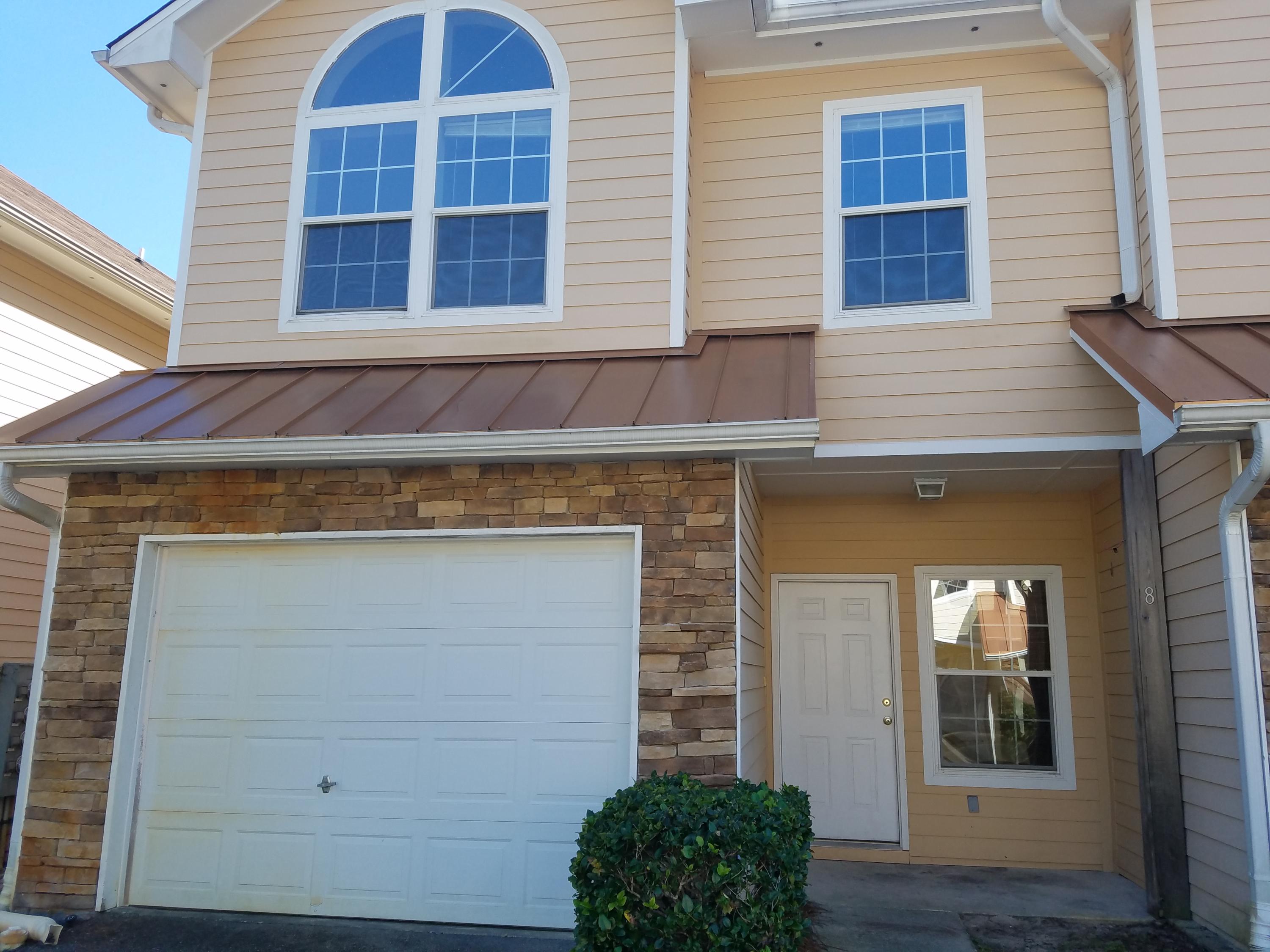 732 East Mack Bayou Drive, Unit 8 Santa Rosa Beach, FL 32459 - Photo 4 of 17 a view of a house with a door and a windows
