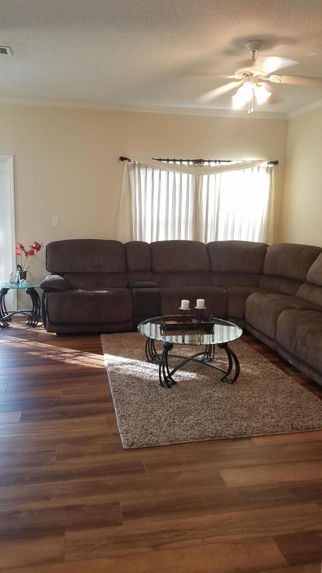 732 East Mack Bayou Drive, Unit 8 Santa Rosa Beach, FL 32459 - Photo 6 of 17 a living room with couch and a window