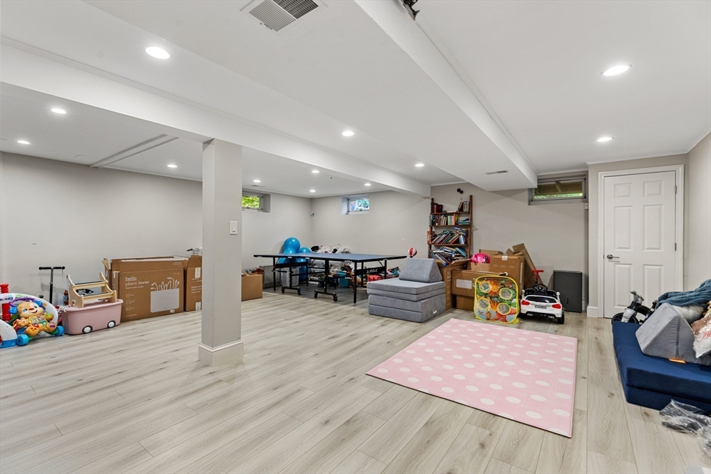 16 Cooke Road Lexington, MA 02420 - Photo 18 of 21 a room with furniture and a wooden floor