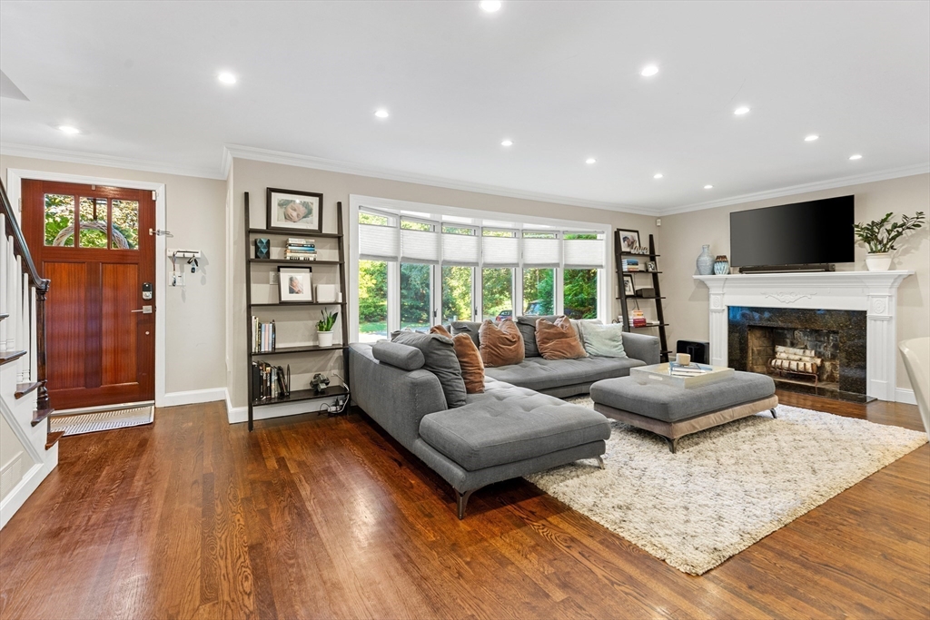 16 Cooke Road Lexington, MA 02420 - Photo 8 of 21 a living room with furniture and a flat screen tv