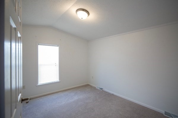 1044 Phillips Road, Unit 12 New Bedford, MA 02745 - Photo 7 of 9 an empty room with a window