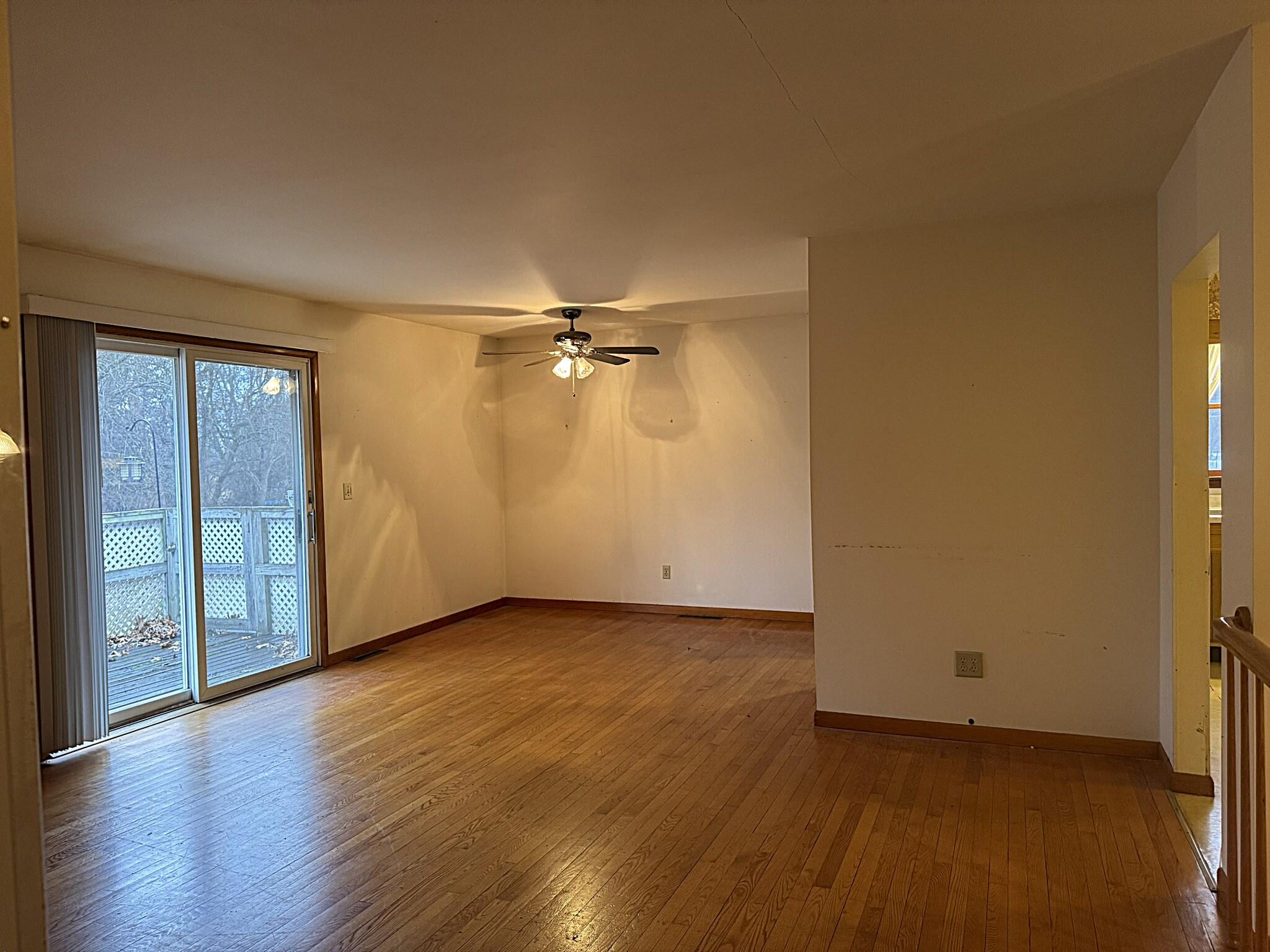 11108 North 550 East Demotte, IN 46310 - Photo 12 of 42 a view of a room with wooden floor closet and windows