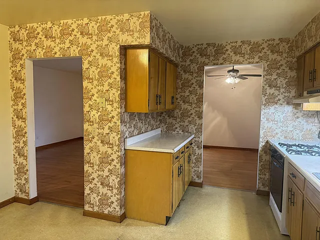 view of a bathroom with a sink and mirror