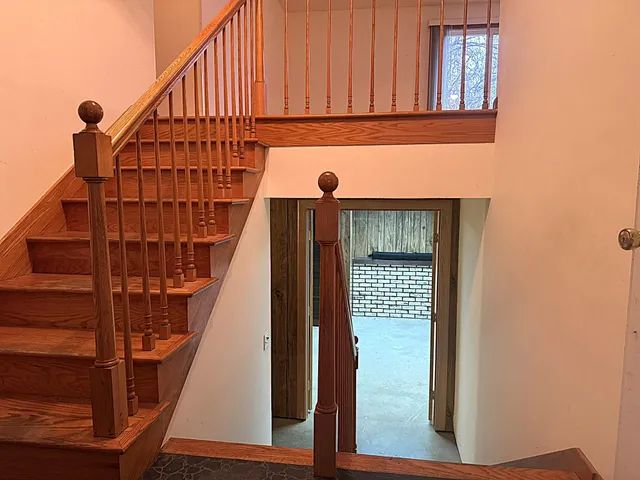 a view of entryway with wooden floor