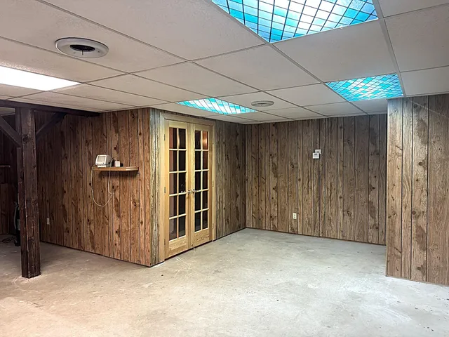 a view of an empty room with an entryway