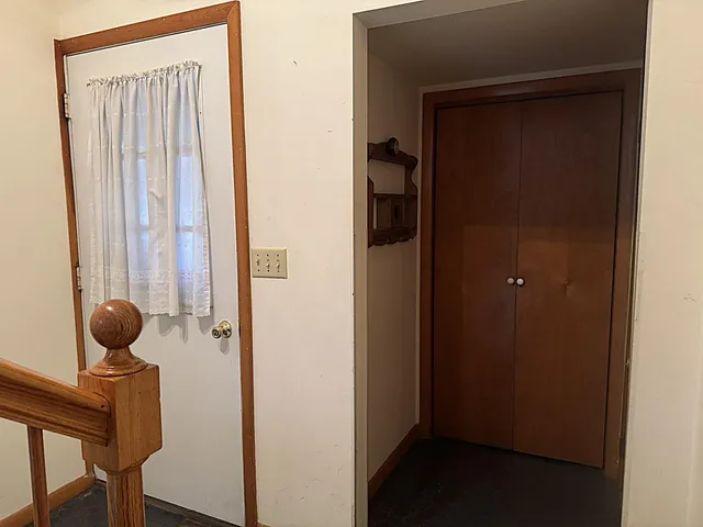 a view of bathroom with a mirror