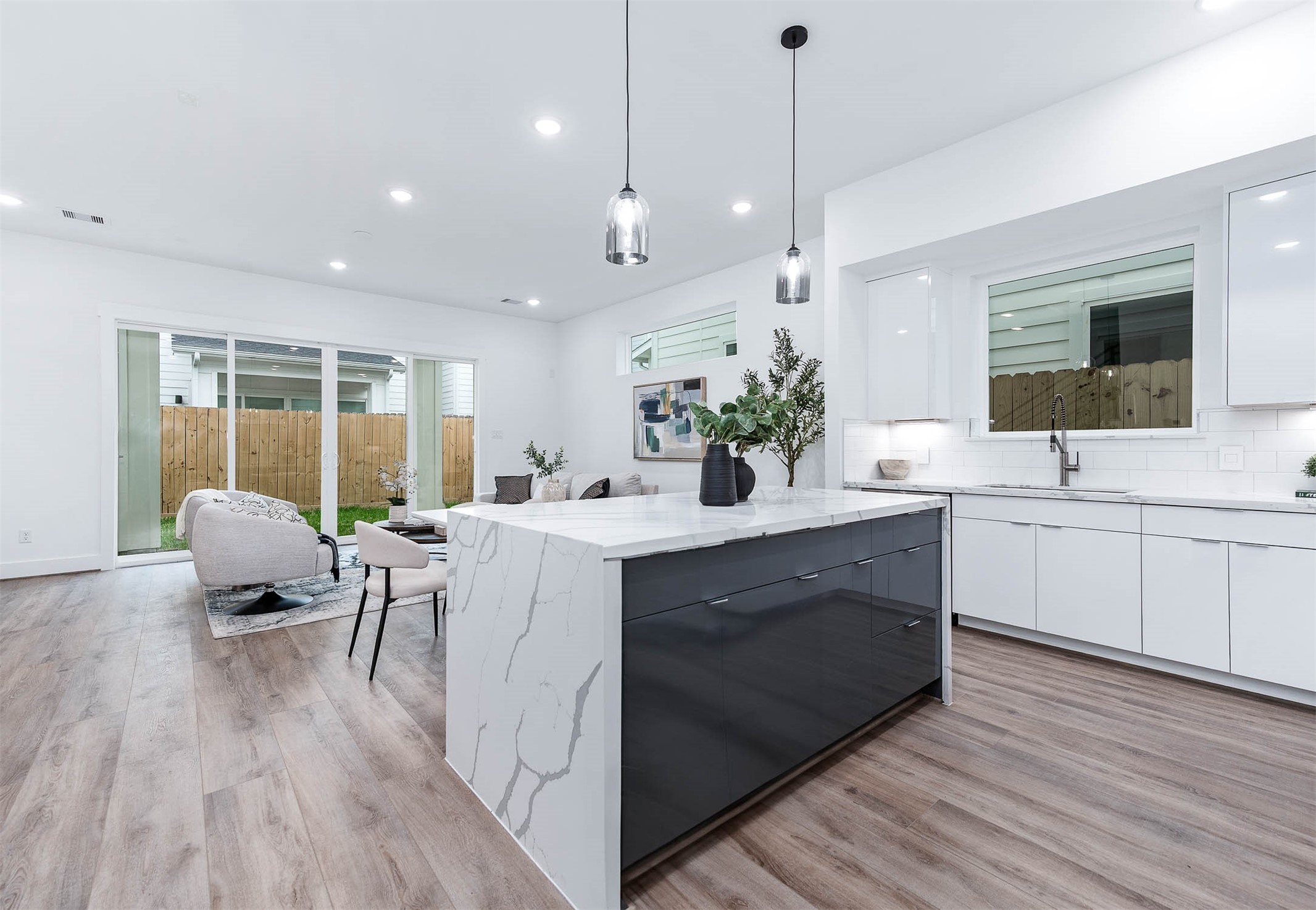 3509 McIlhenny Street Houston, TX 77004 - Photo 15 of 36 a spacious bathroom with a double vanity sink a mirror and a bathtub
