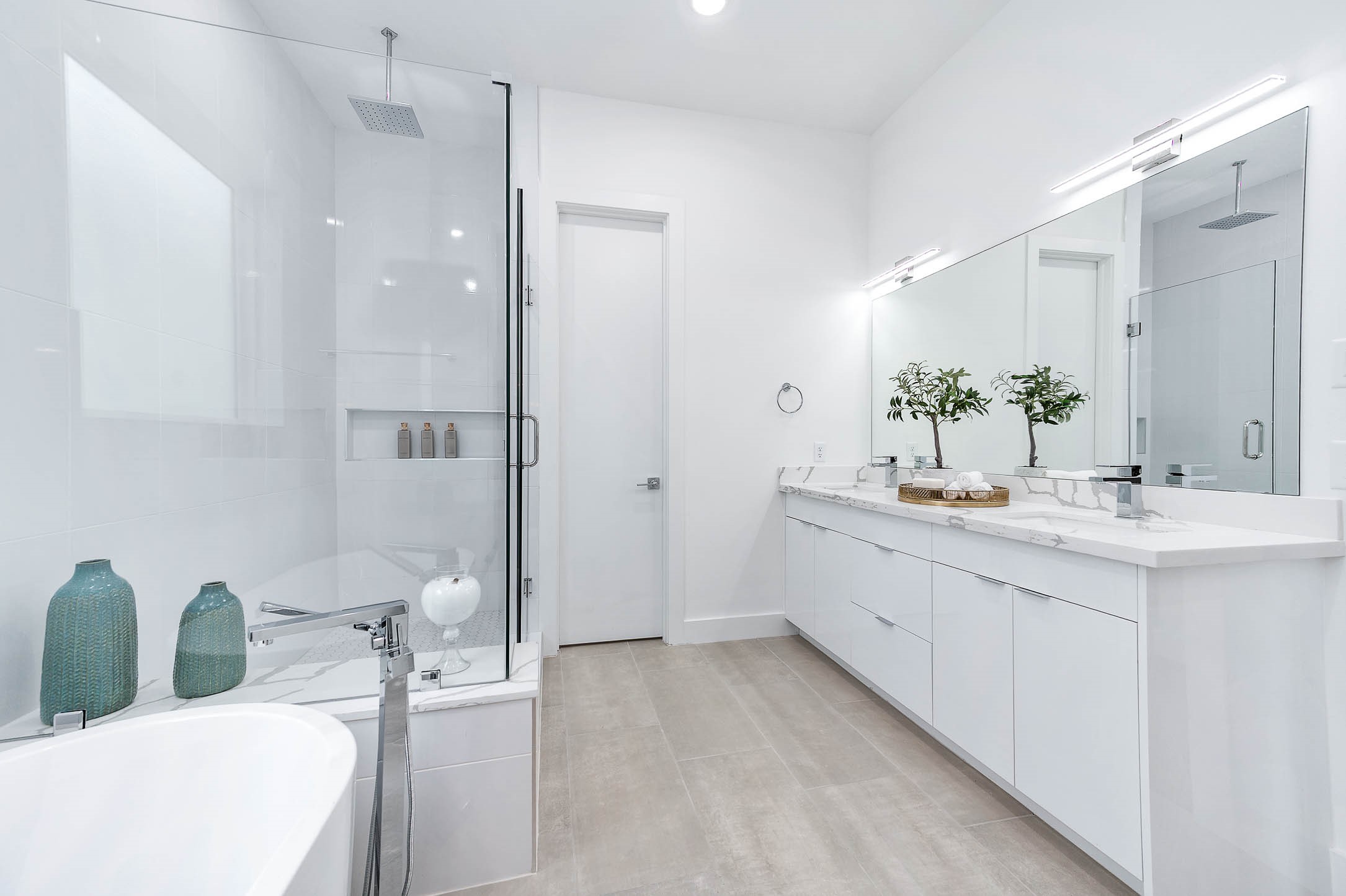 3509 McIlhenny Street Houston, TX 77004 - Photo 26 of 36 a bathroom with a double vanity sink mirror and shower
