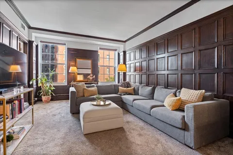 a kitchen with granite countertop a stove cabinets and refrigerator