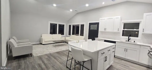 a spacious bathroom with a double vanity sink double and mirror