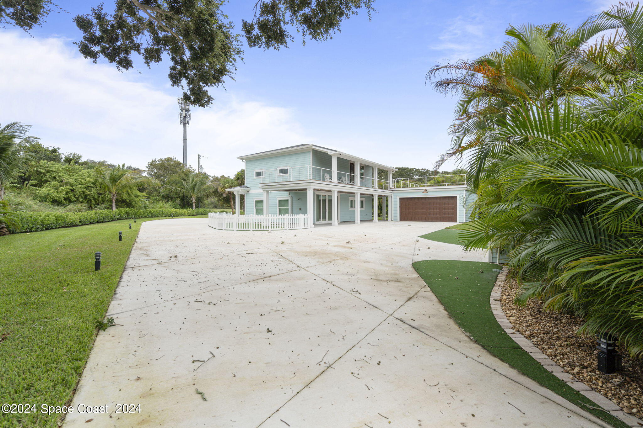 1760 Highway 1 Malabar, FL 32950 - Photo 31 of 40 a front view of a house with a garden