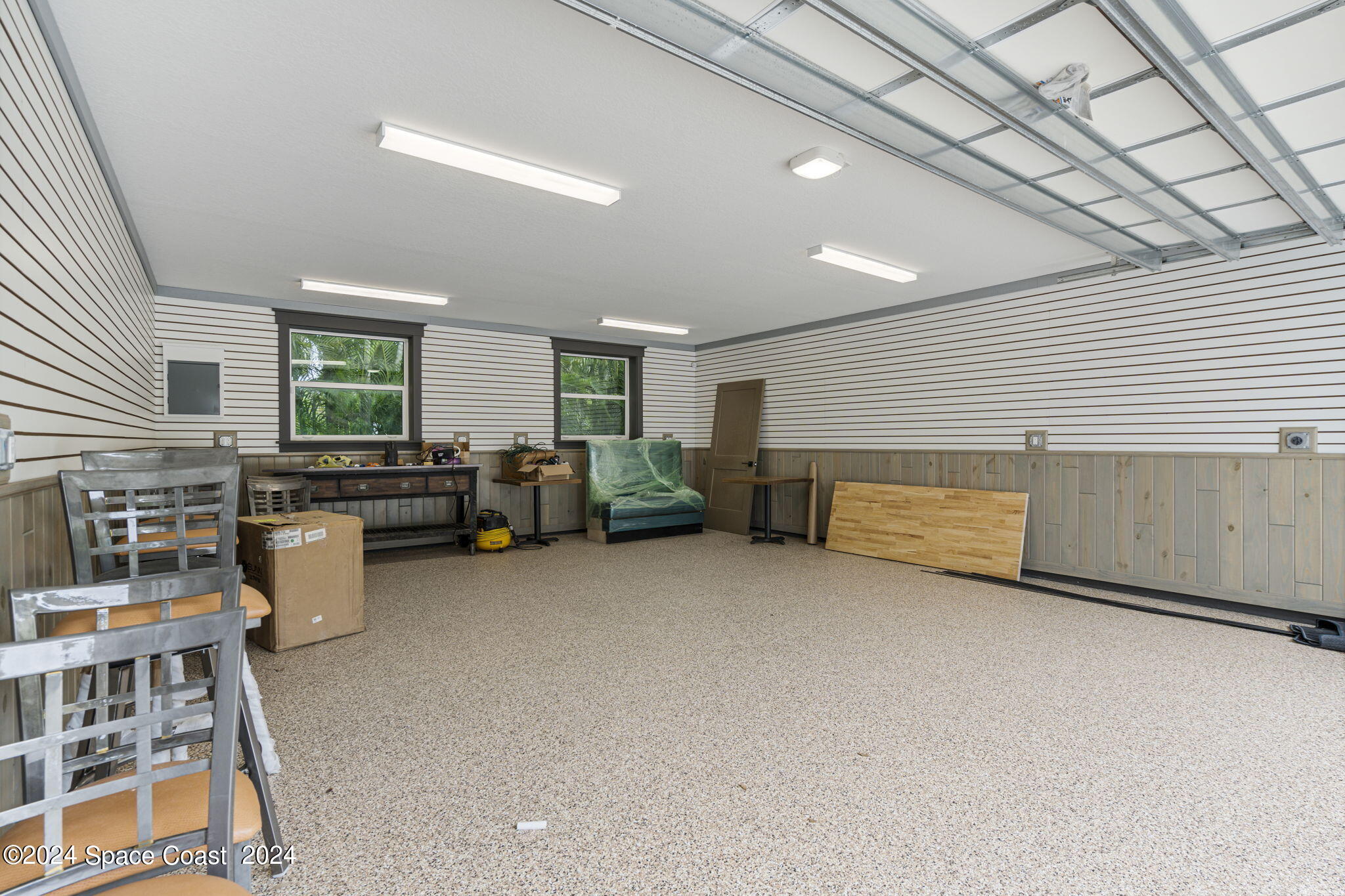 1760 Highway 1 Malabar, FL 32950 - Photo 40 of 40 a bed room with furniture and a book shelf