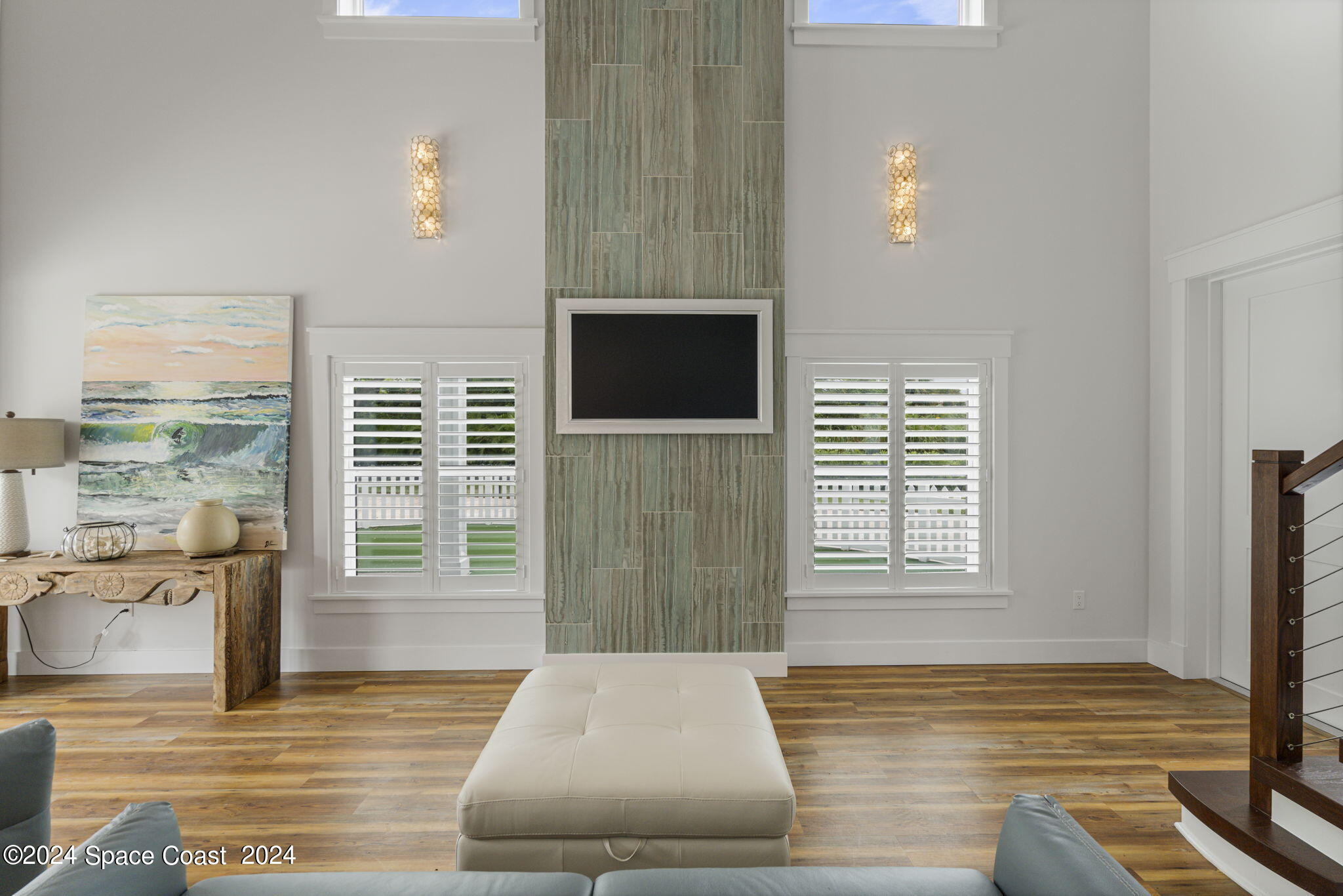 1760 Highway 1 Malabar, FL 32950 - Photo 4 of 40 a living room with furniture and a flat screen tv