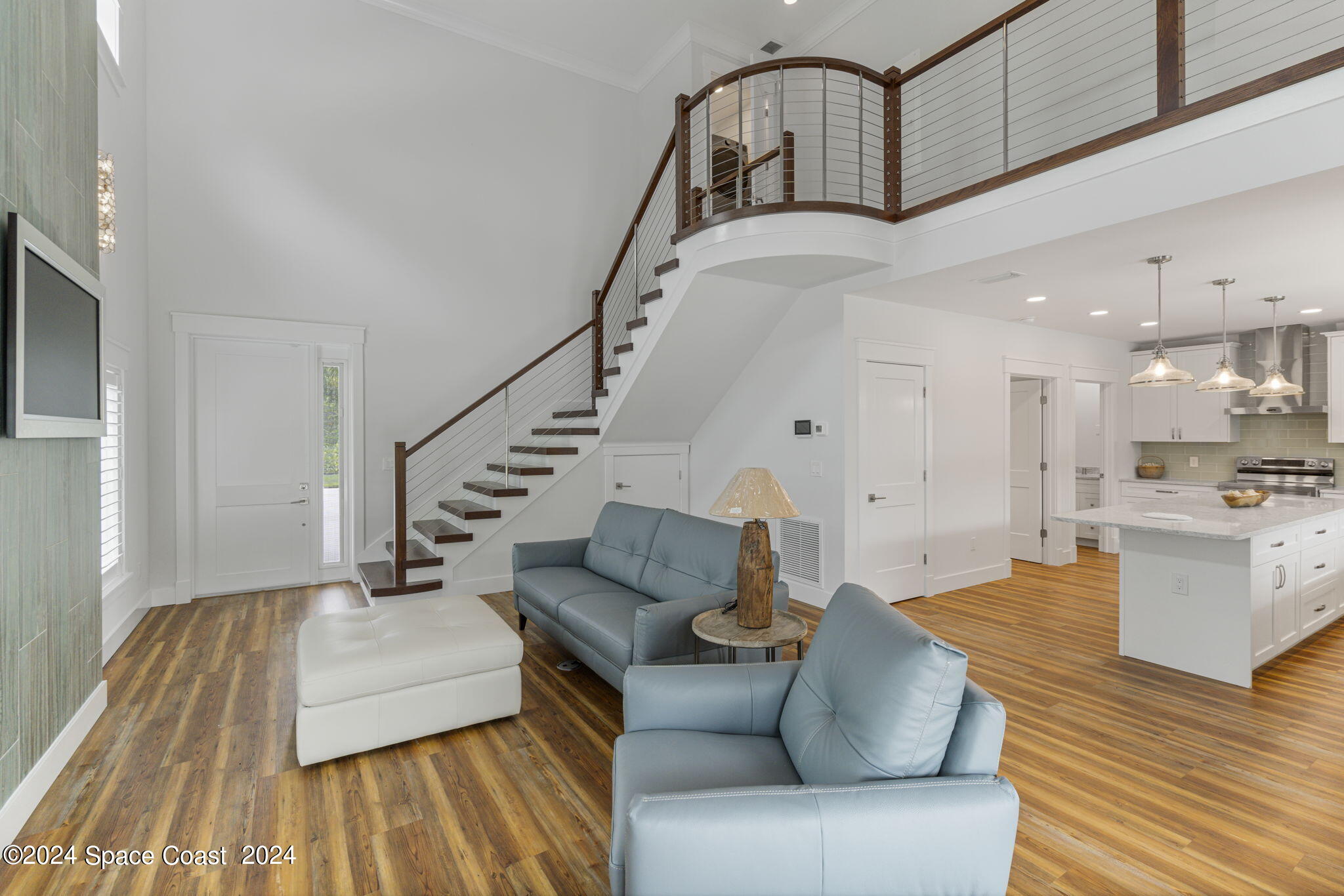 1760 Highway 1 Malabar, FL 32950 - Photo 6 of 40 a living room with furniture and wooden floor