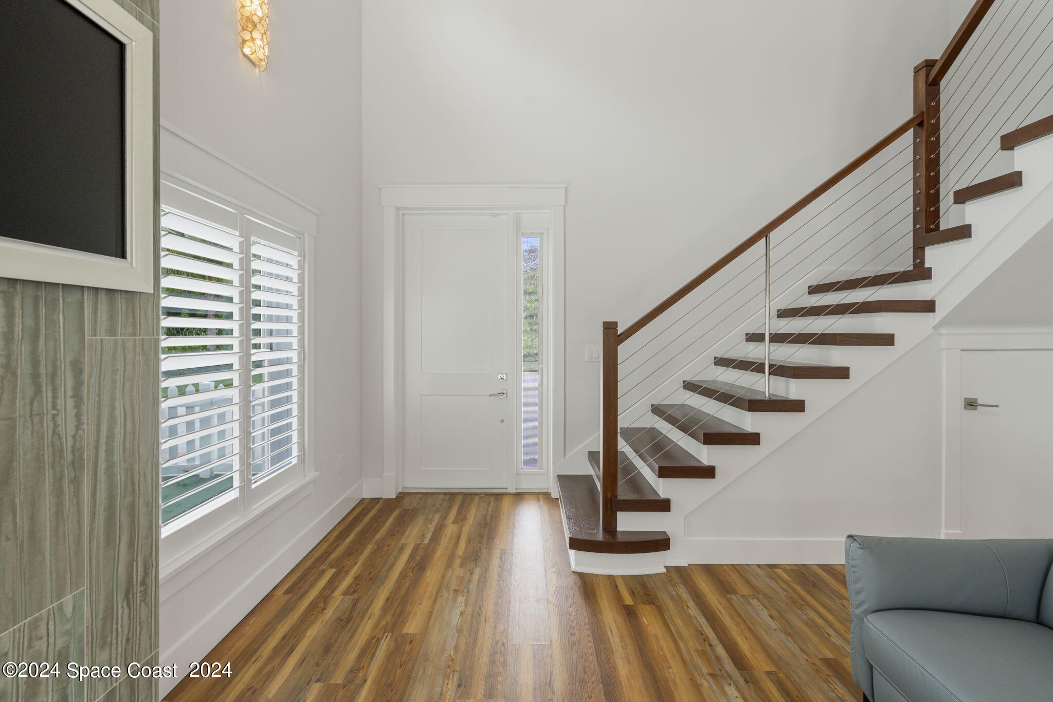1760 Highway 1 Malabar, FL 32950 - Photo 9 of 40 a view of entryway and hall with wooden floor