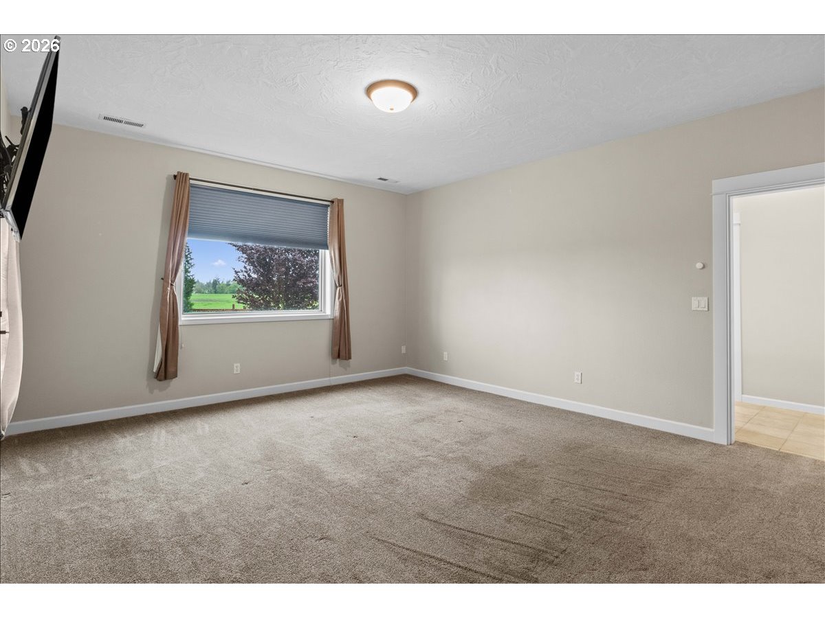 9864 Hoffman Road Monmouth, OR 97361 - Photo 24 of 48 a view of an empty room with a window