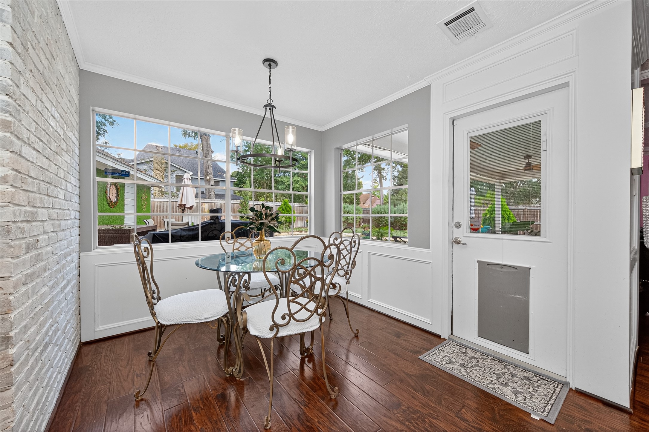 3602 Blue Cypress Drive Spring, TX 77388 - Photo 19 of 44 a dining room with furniture a chandelier and wooden floor