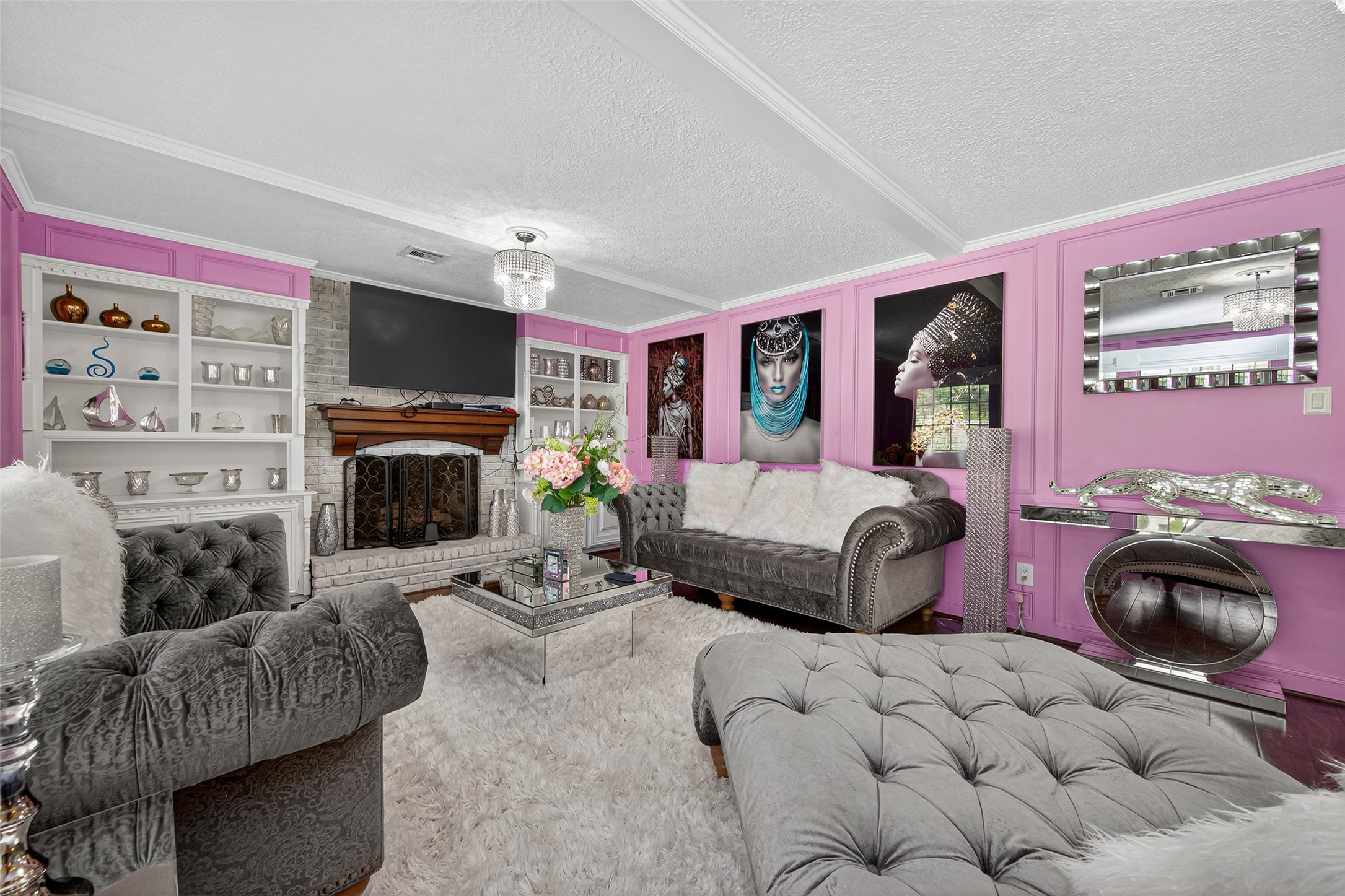 3602 Blue Cypress Drive Spring, TX 77388 - Photo 21 of 44 a bedroom with furniture a flat screen tv and a fireplace