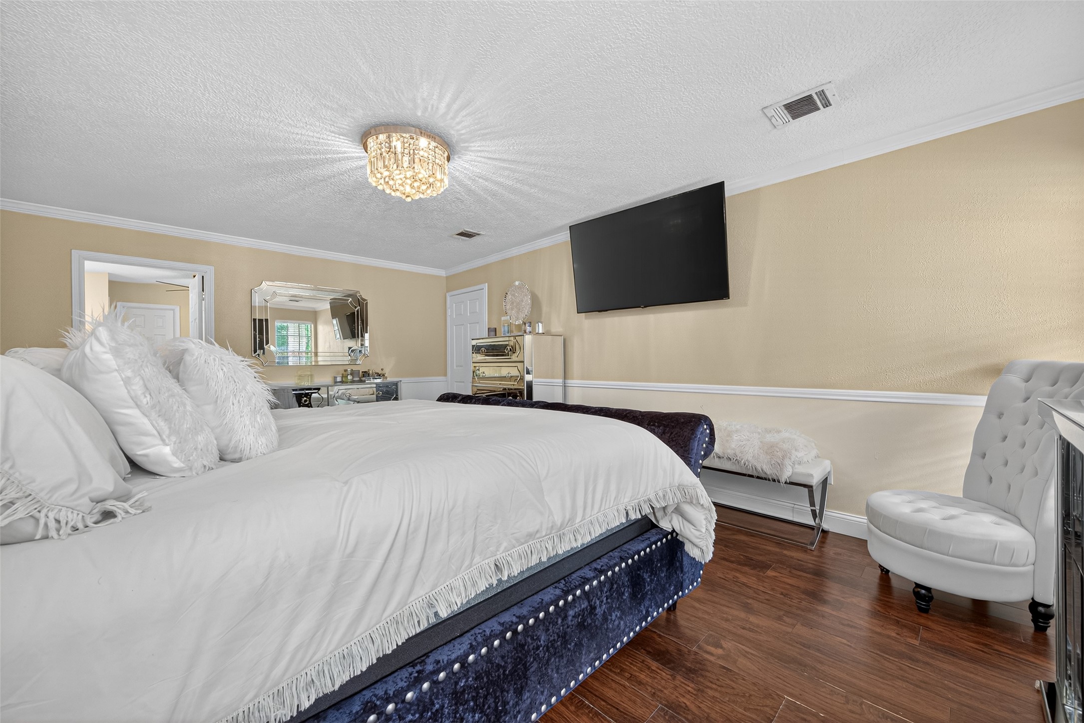 3602 Blue Cypress Drive Spring, TX 77388 - Photo 34 of 44 a bedroom with a bed and a chair