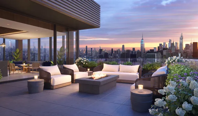 a view of hall way with furniture and floor to ceiling window