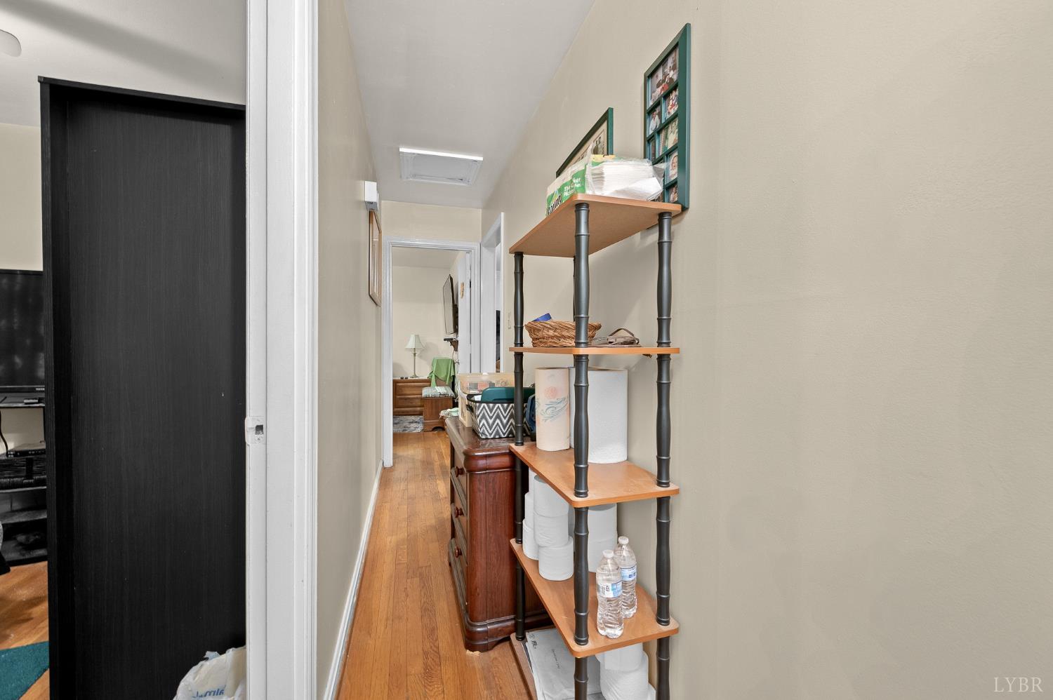 129 Greendale Drive Rustburg, VA 24588 - Photo 13 of 35 a view of a hallway with wooden floor and staircase