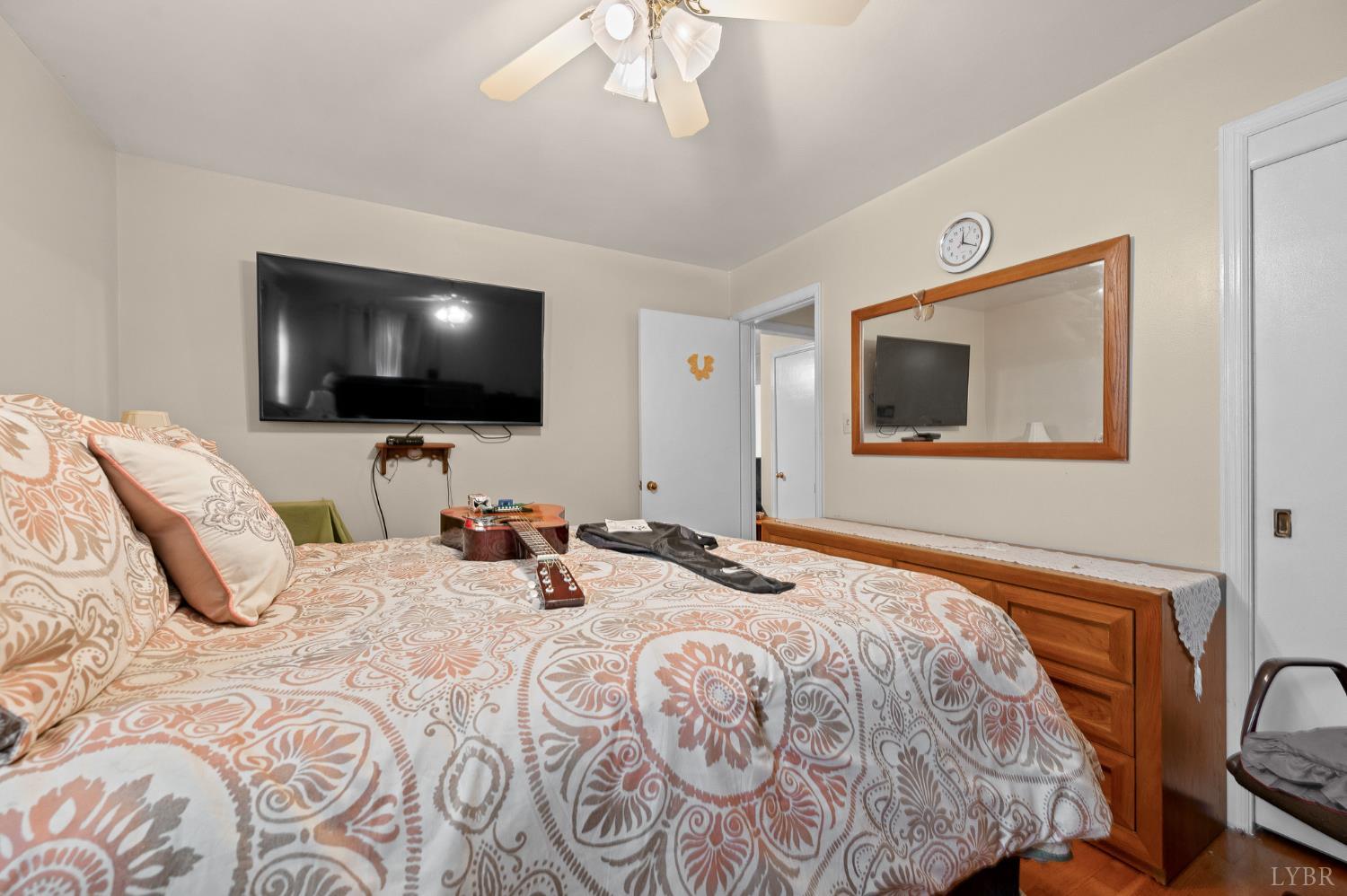 129 Greendale Drive Rustburg, VA 24588 - Photo 17 of 35 a bedroom with a bed and a flat screen tv