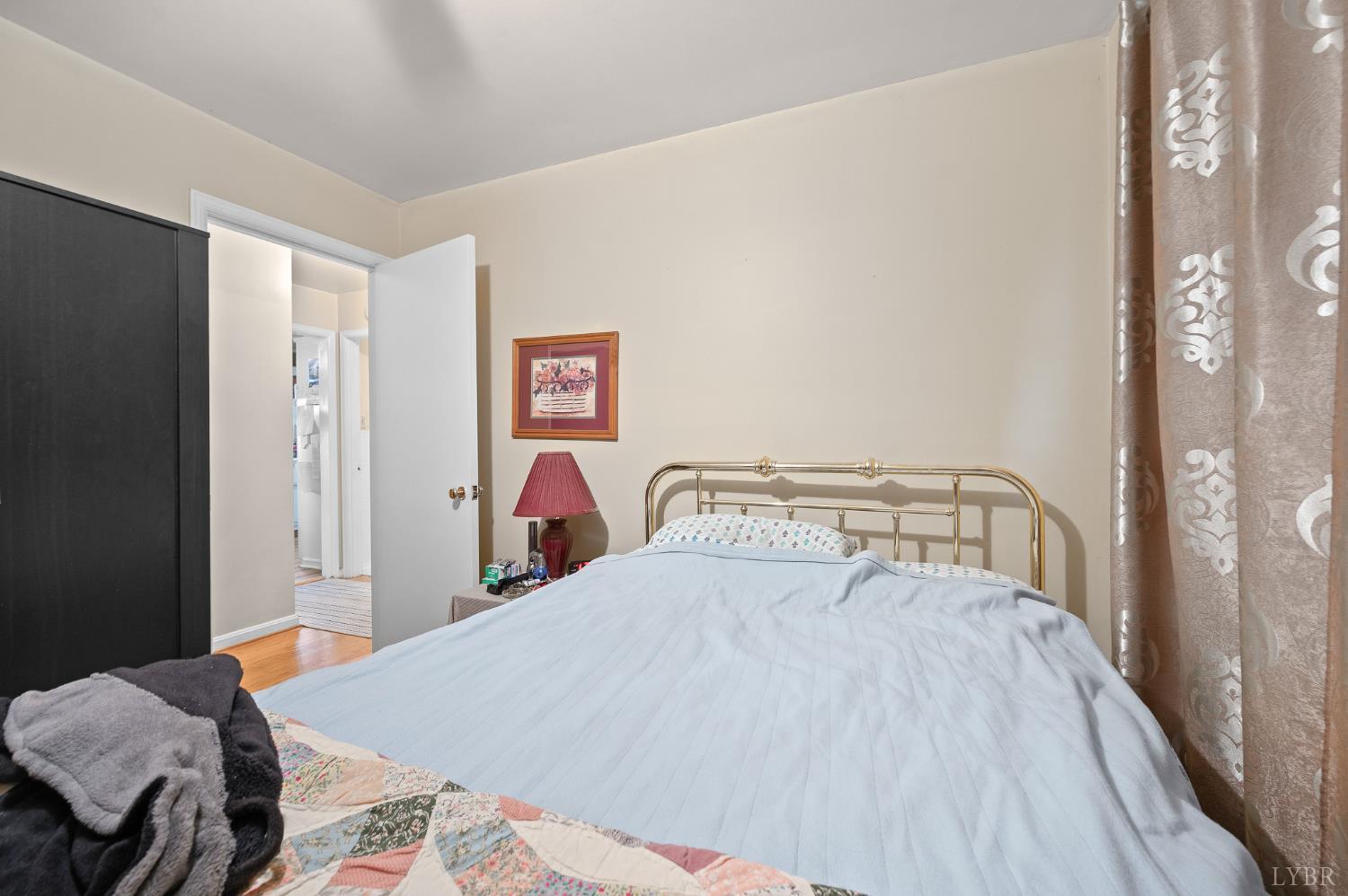 129 Greendale Drive Rustburg, VA 24588 - Photo 19 of 35 a bedroom with a bed and a table