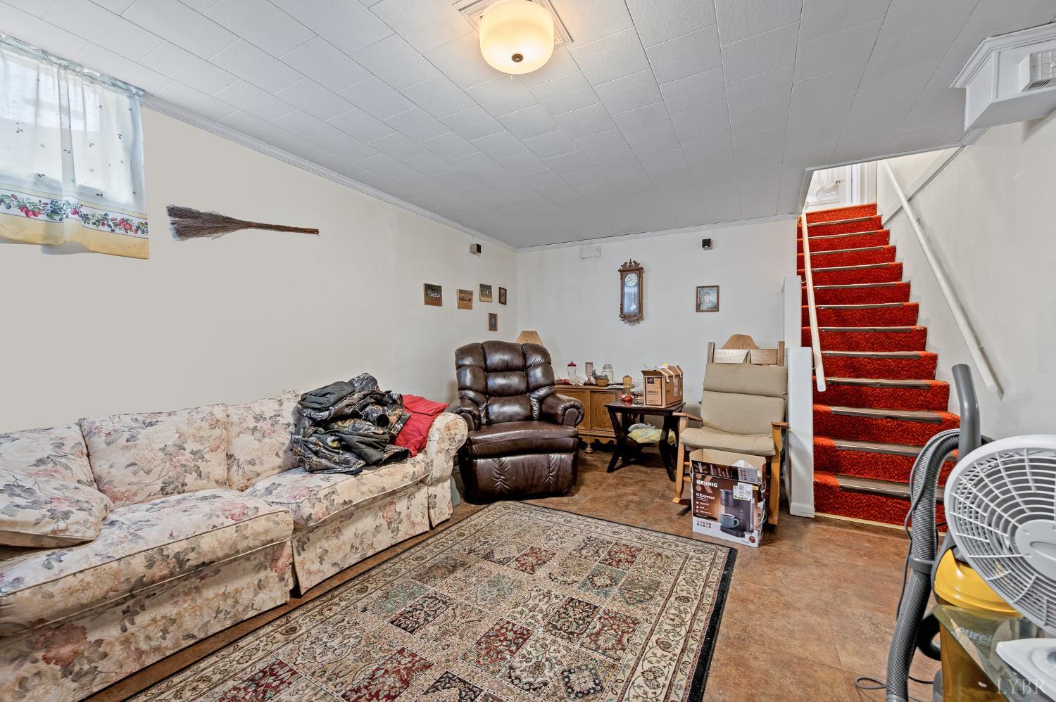 129 Greendale Drive Rustburg, VA 24588 - Photo 21 of 35 a living room with furniture and stairs