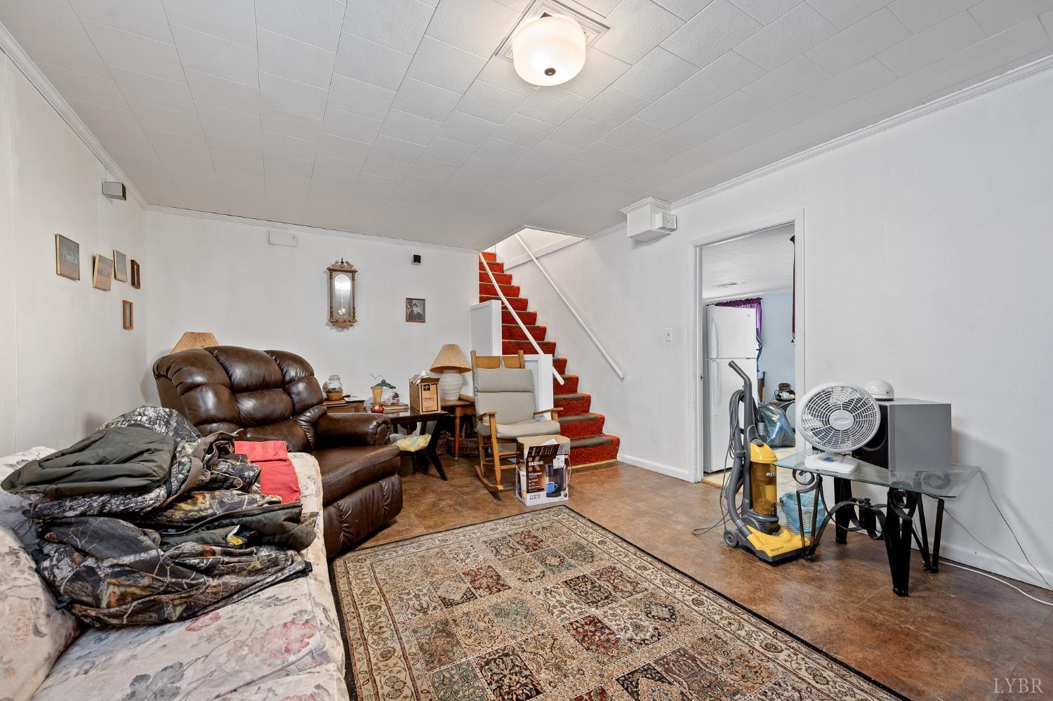 129 Greendale Drive Rustburg, VA 24588 - Photo 22 of 35 a living room with lots of furniture and wooden floor