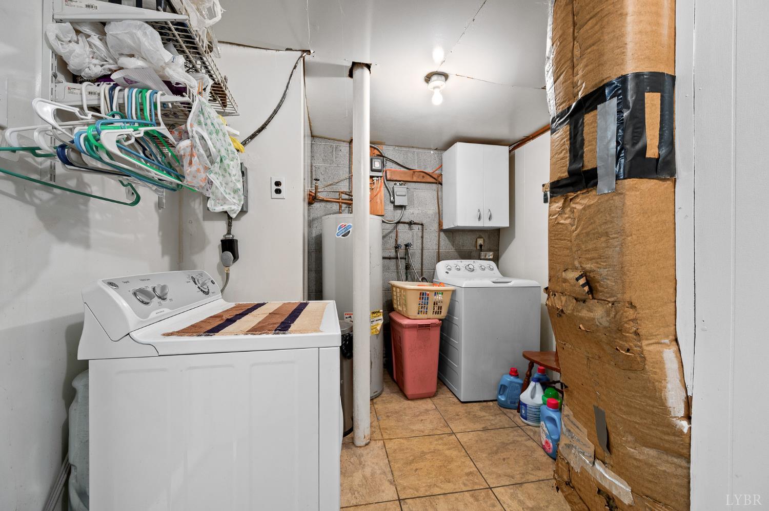 129 Greendale Drive Rustburg, VA 24588 - Photo 27 of 35 a room with water heater and storage