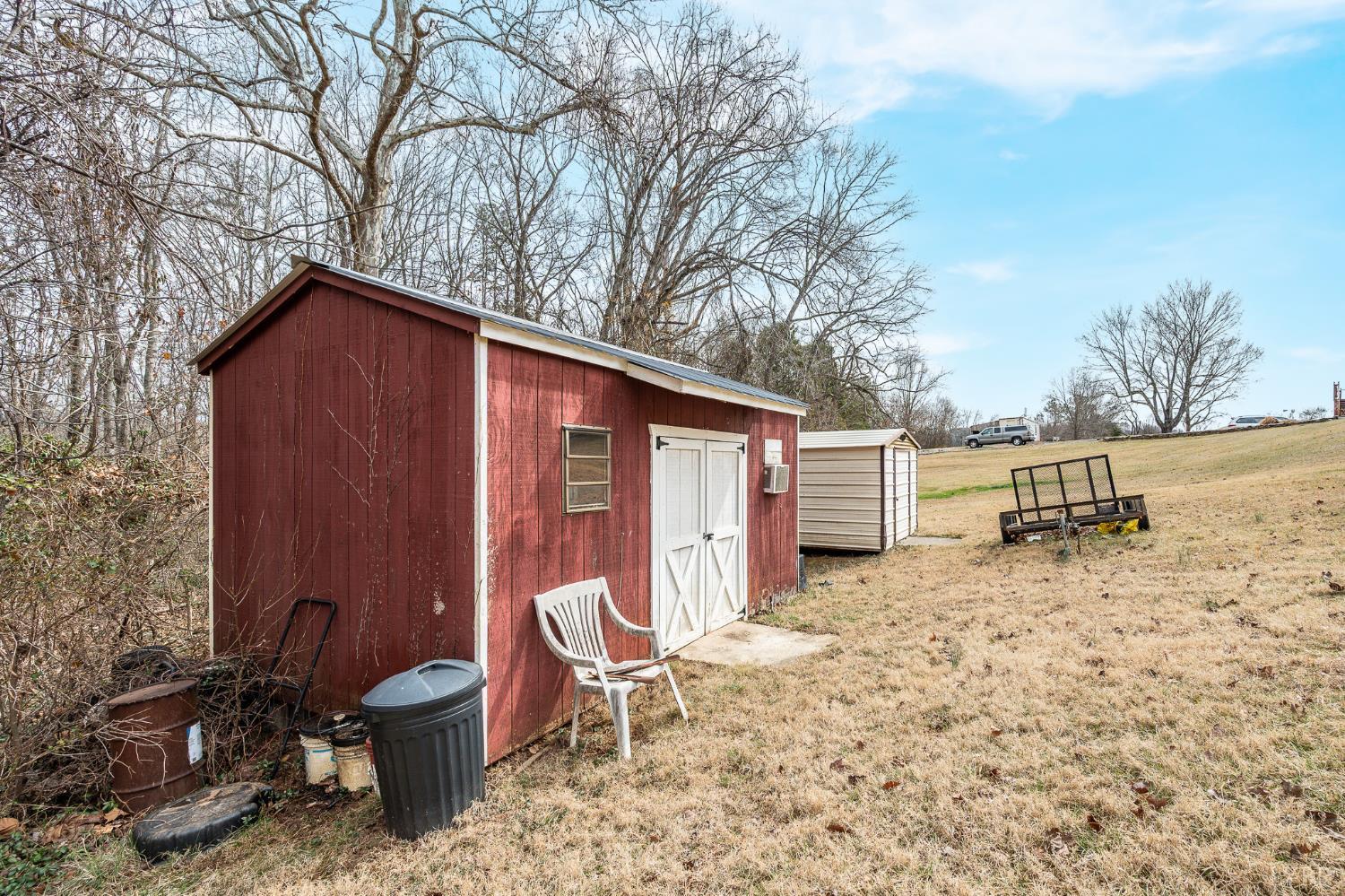 129 Greendale Drive Rustburg, VA 24588 - Photo 34 of 35 a backyard of a house with seating space