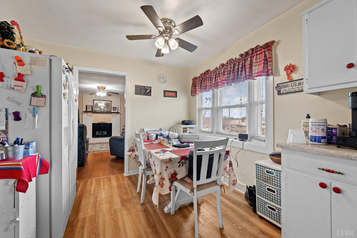 129 Greendale Drive Rustburg, VA 24588 - Photo 9 of 35 a view of a dining room with furniture window and wooden floor