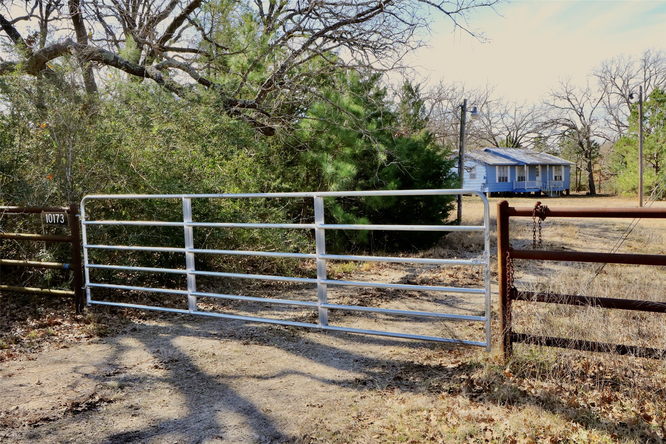 10173 Deer Ridge Road Bedias, TX 77831 - Photo 21 of 46 a view of a street with houses in the background