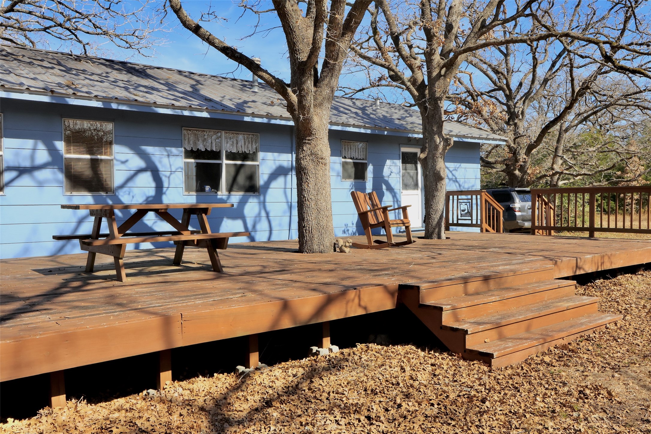 10173 Deer Ridge Road Bedias, TX 77831 - Photo 6 of 46 a view of a swimming pool with chairs