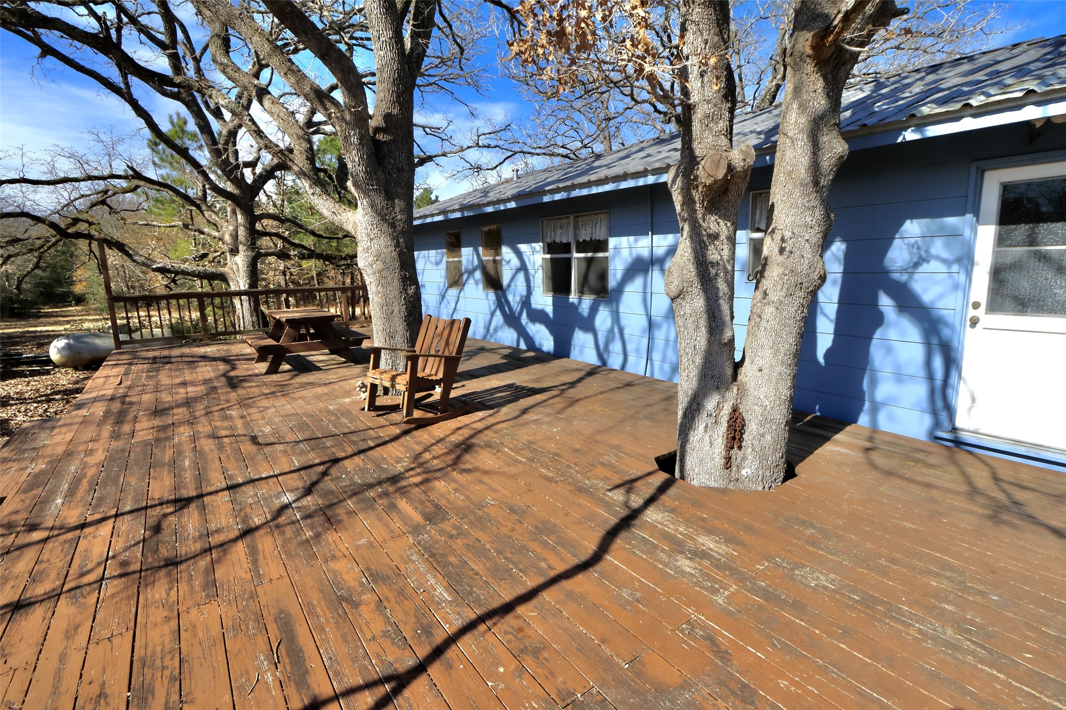 10173 Deer Ridge Road Bedias, TX 77831 - Photo 7 of 46 a view of a house with snow on the wall