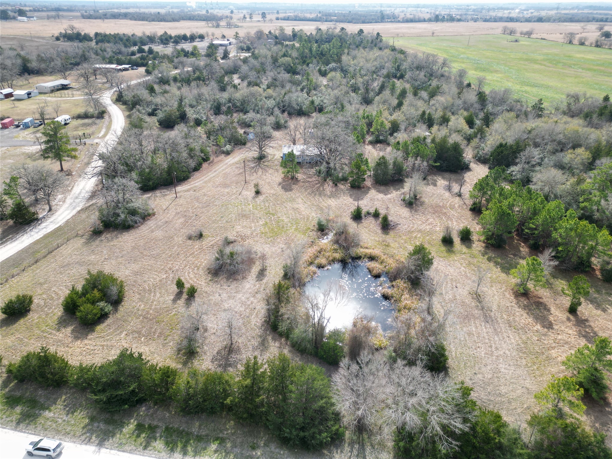 10173 Deer Ridge Road Bedias, TX 77831 - Photo 10 of 46 an aerial view of house with yard