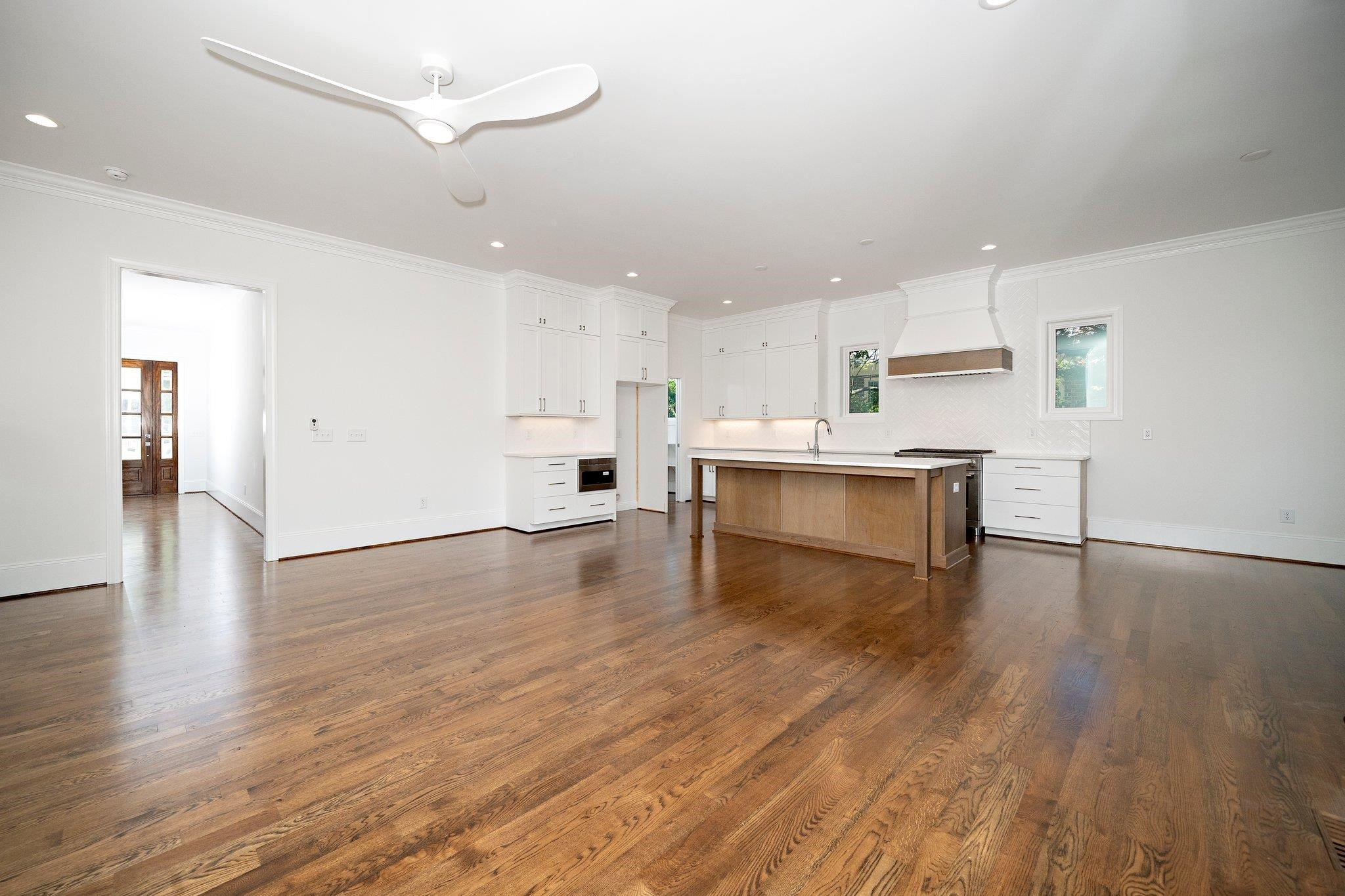 1809 Fairview Road Raleigh, NC 27608 - Photo 19 of 37 a view of kitchen with cabinets and wooden floor