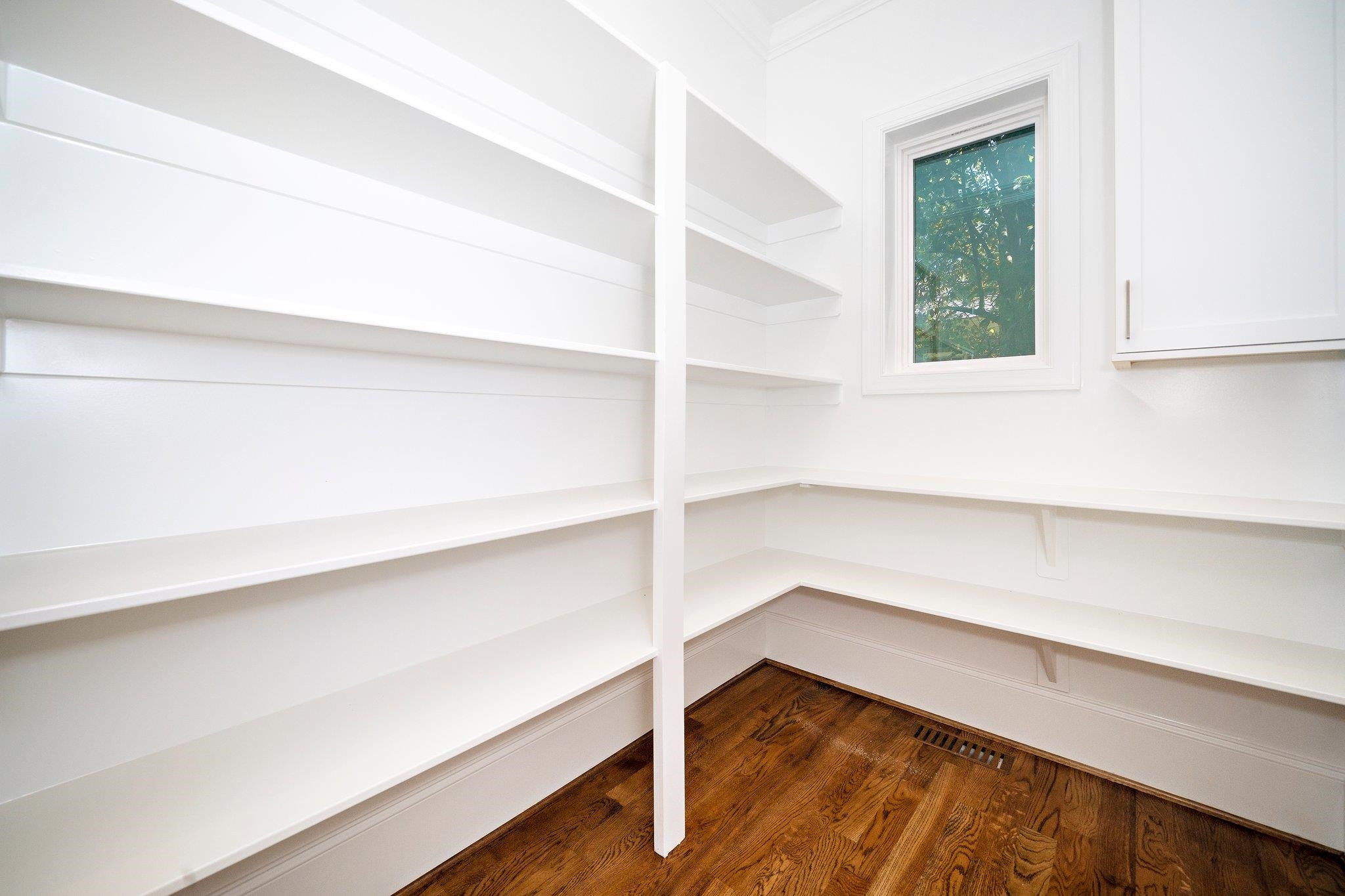 1809 Fairview Road Raleigh, NC 27608 - Photo 24 of 37 a view of a room with shelf