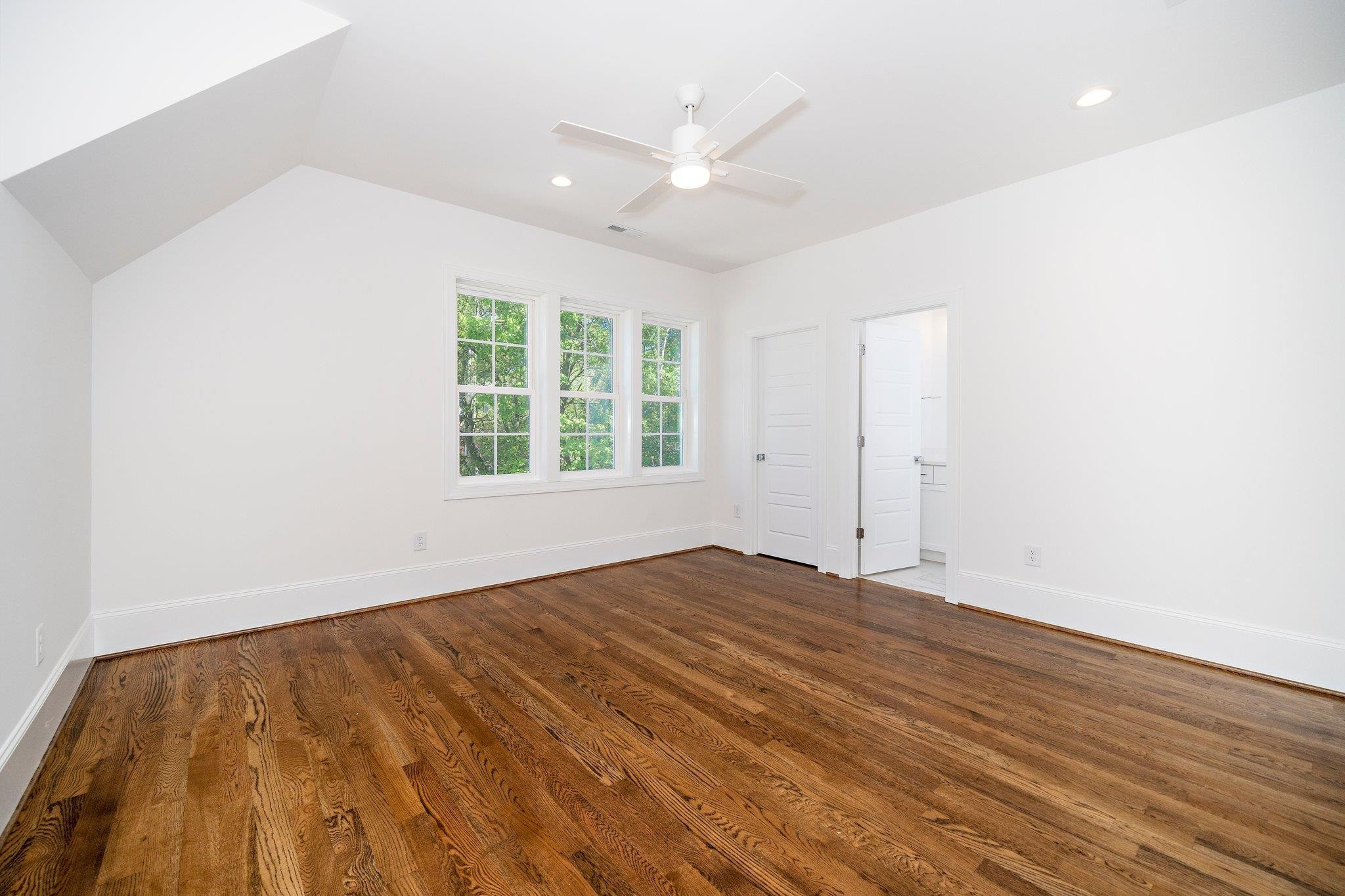 1809 Fairview Road Raleigh, NC 27608 - Photo 27 of 37 wooden floor in an empty room