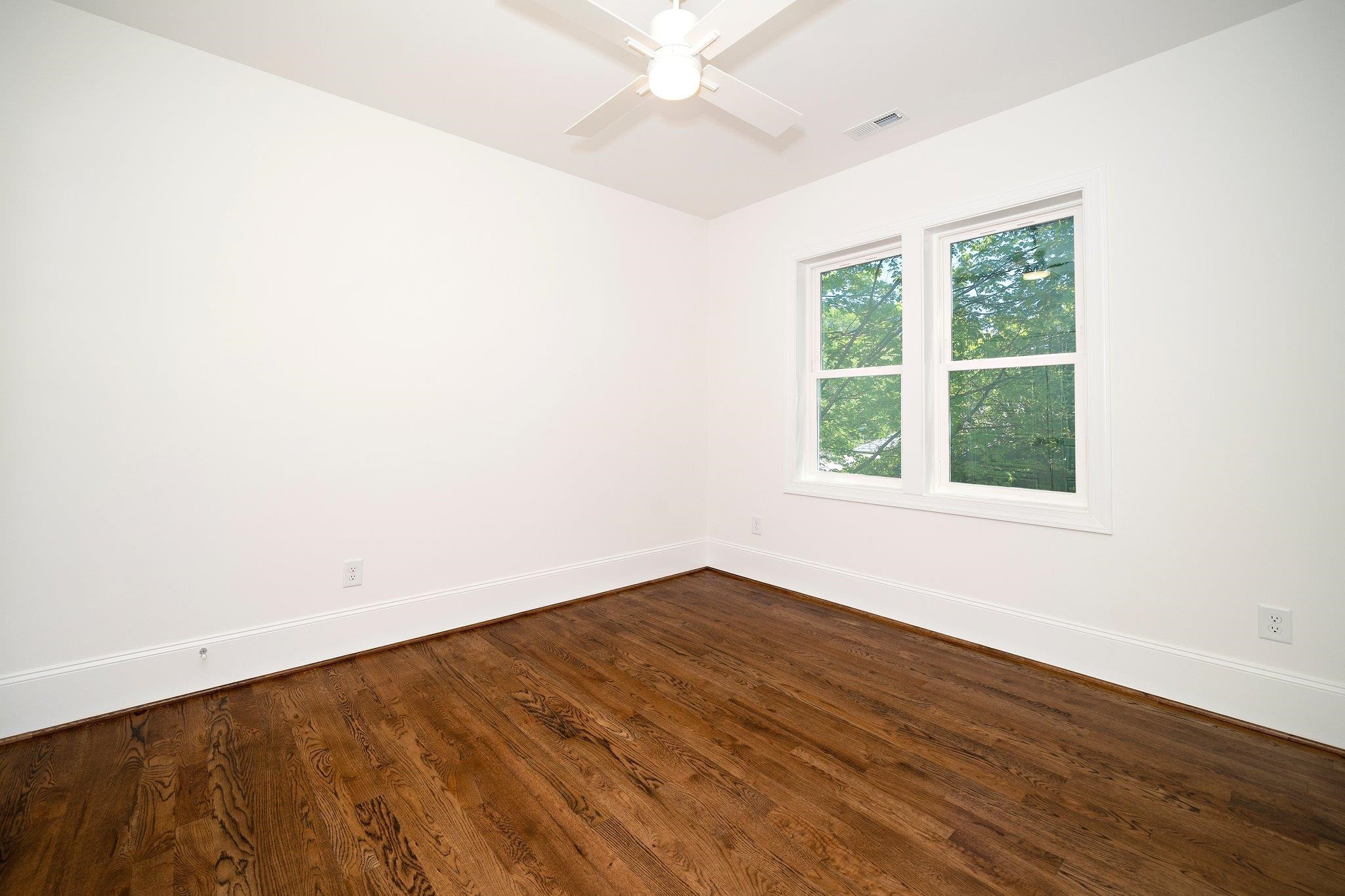 1809 Fairview Road Raleigh, NC 27608 - Photo 30 of 37 an empty room with a window