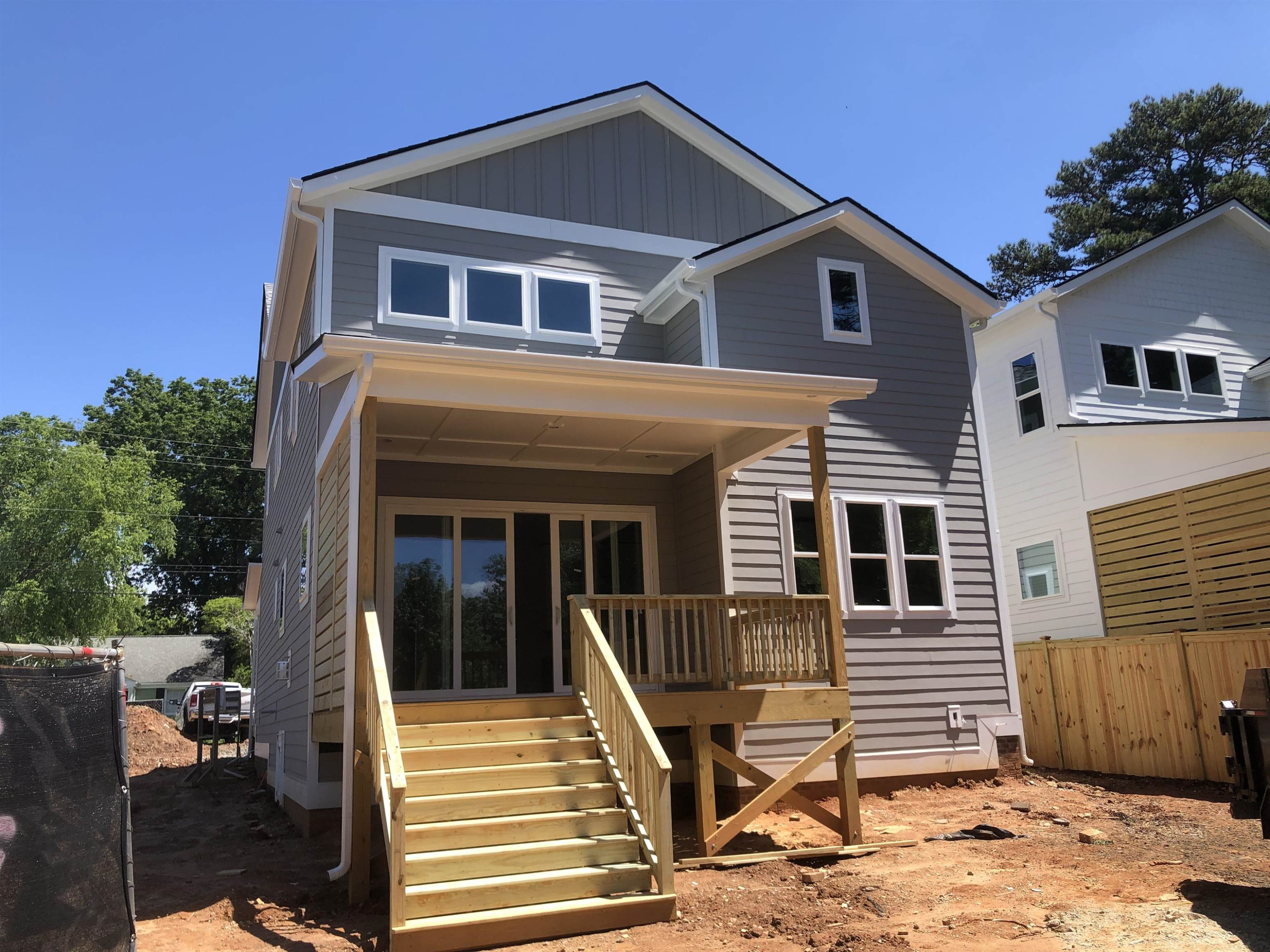 1809 Fairview Road Raleigh, NC 27608 - Photo 5 of 37 a front view of a house with a patio