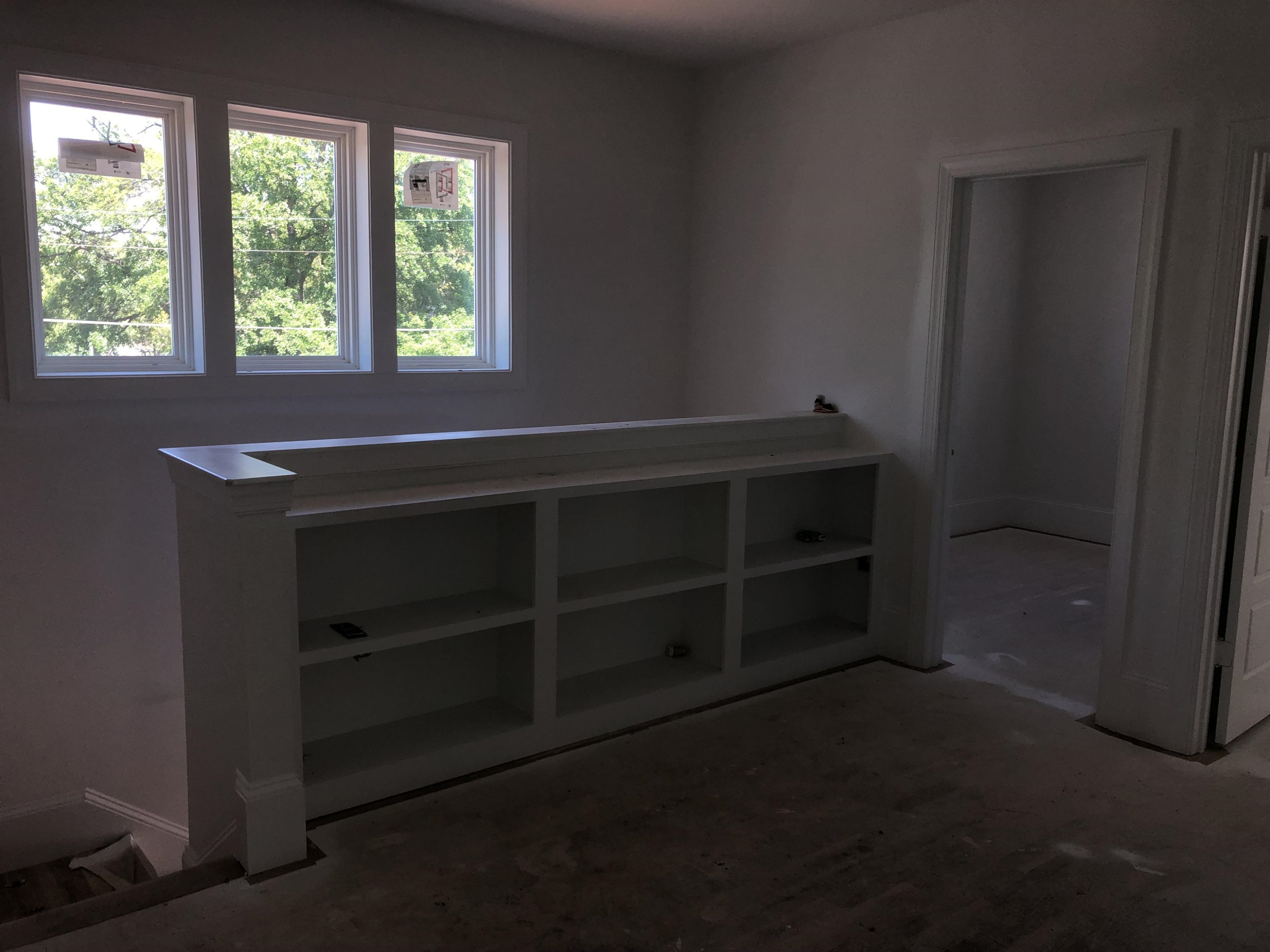 1809 Fairview Road Raleigh, NC 27608 - Photo 9 of 37 a view of an empty room with a window