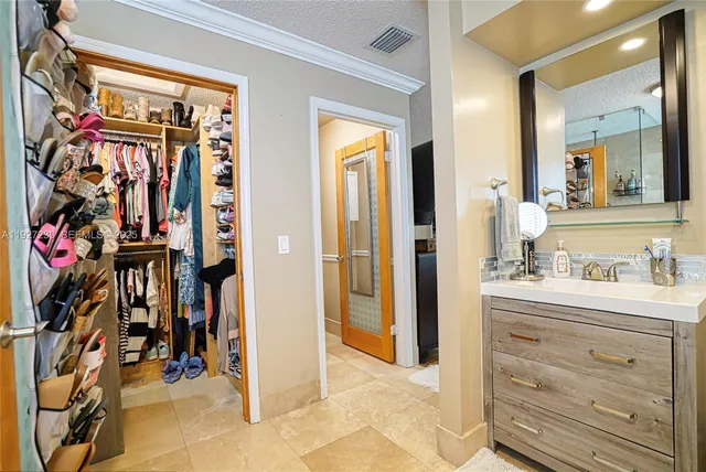 a view of an entryway with a mirror