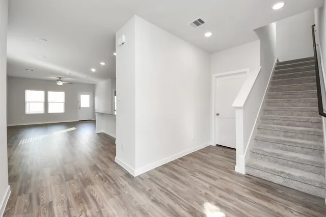 a view of entryway with wooden floor