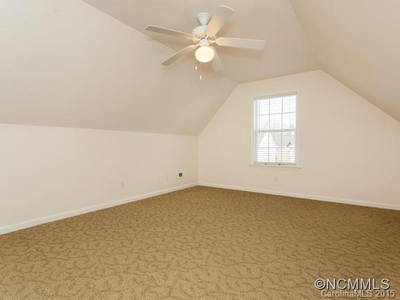 127 Pamlico Road Fletcher, NC 28732 - Photo 16 of 22 an empty room with windows and ceiling fan