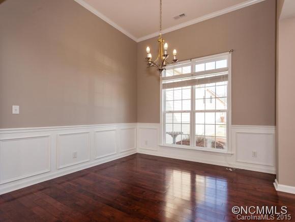 127 Pamlico Road Fletcher, NC 28732 - Photo 6 of 22 a view of an empty room with wooden floor and a window