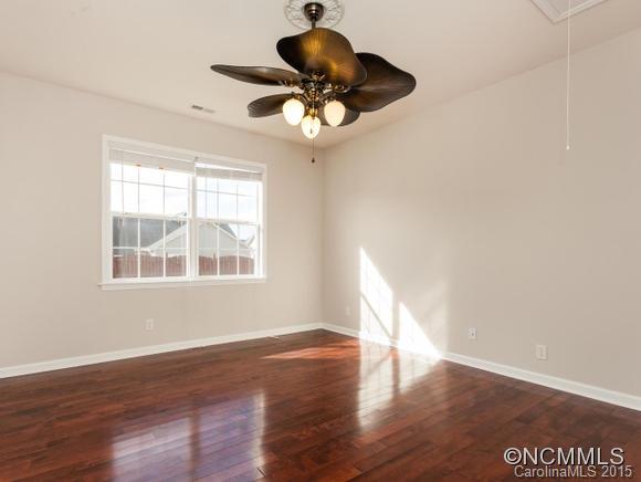 127 Pamlico Road Fletcher, NC 28732 - Photo 9 of 22 a view of entryway and hall with wooden floor