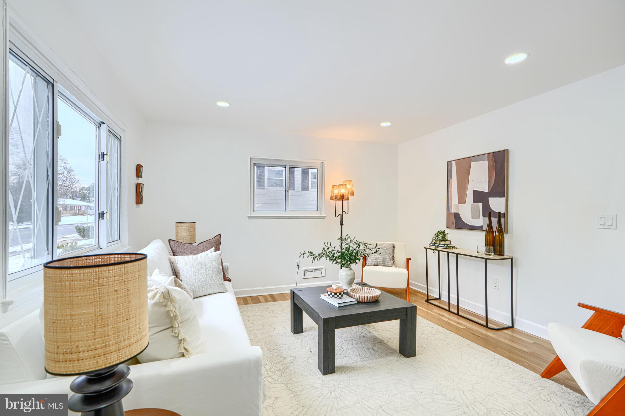 6112 Chesworth Road Baltimore, MD 21228 - Photo 11 of 47 a living room with furniture and a window